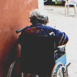 Son Leaves Mom in Wheelchair on the Street, Year Later Sees Her Coming to His House on Her Feet – Story of the Day