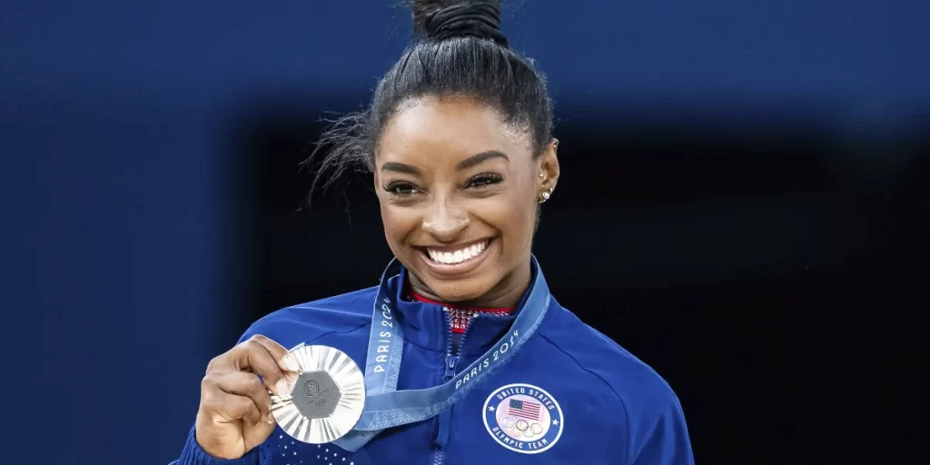 A tropical escape with friends became a swirl of speculation for the most decorated gymnast in history after her latest social media update caught fans’ attention.