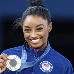 A tropical escape with friends became a swirl of speculation for the most decorated gymnast in history after her latest social media update caught fans’ attention.